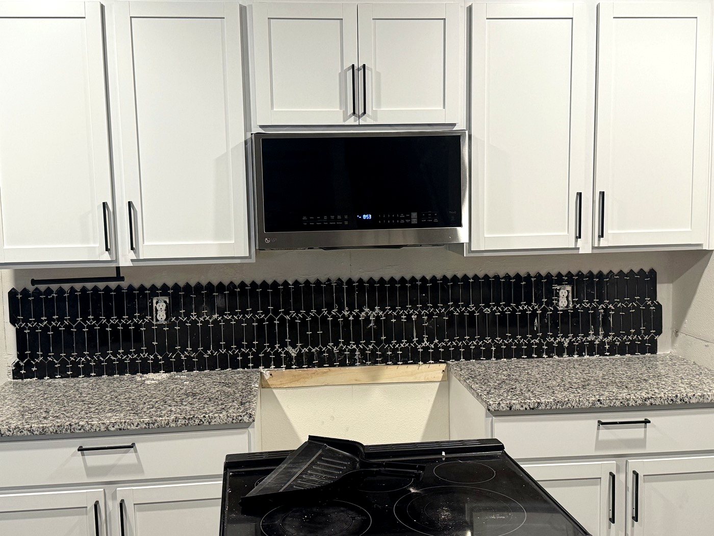 Modern kitchen remodel with stainless appliances